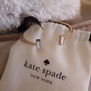 Gold and white kate Spade bracelet